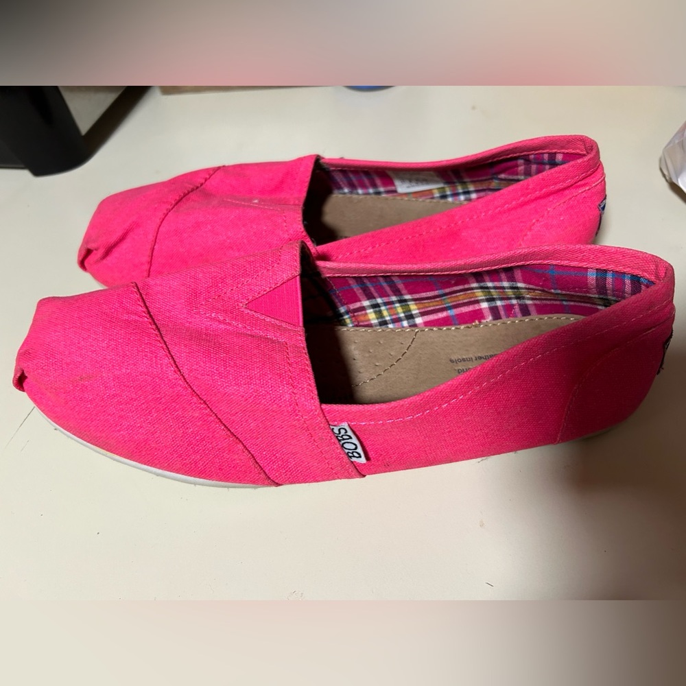Bright pink Bobs. Worn once or twice. Small black mark on left shoe.